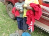 Happy to exchange their ragged clothes